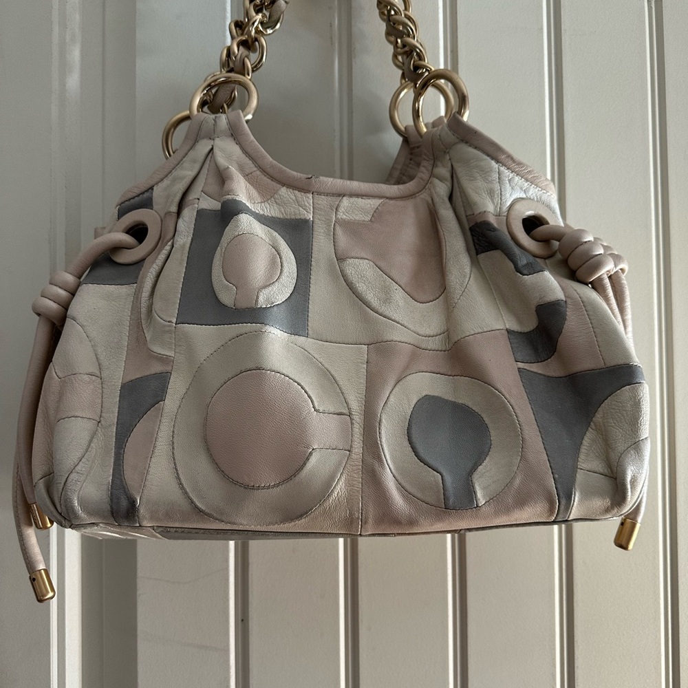 Preloved authentic Coach Parker OP art satchel bag in pastel pink leather.